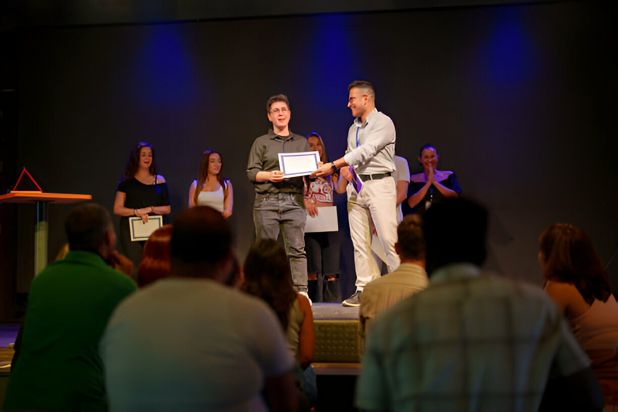 receiving H E B scholarship