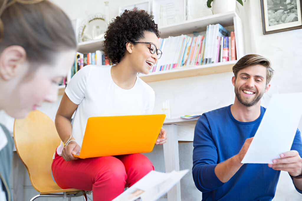 Step-by-step guide on how do I set up a scholarship fund: professionals collaborating on legal documents and funding strategies.